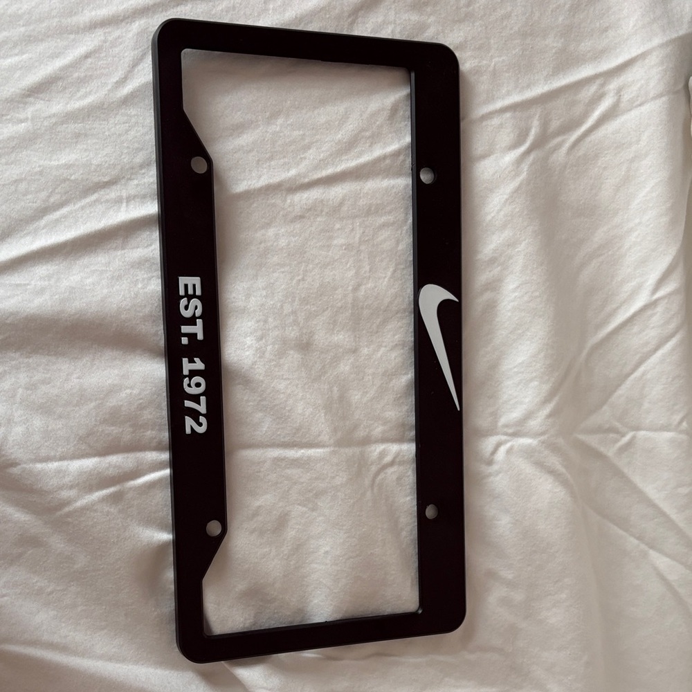 Nike Black License Plate Frame with White Swoosh and EST. 1972